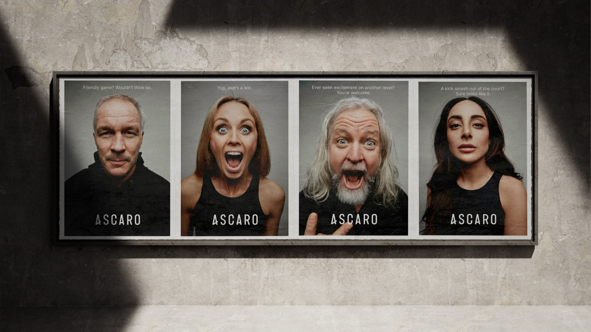 Four Ascaro posters on a wall.